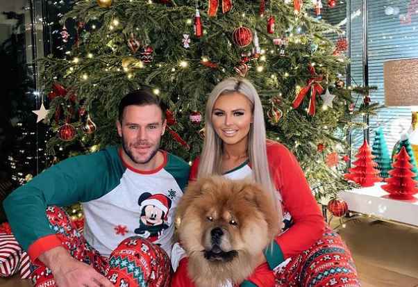 Polly Marchant with her husband celebrating Christmas