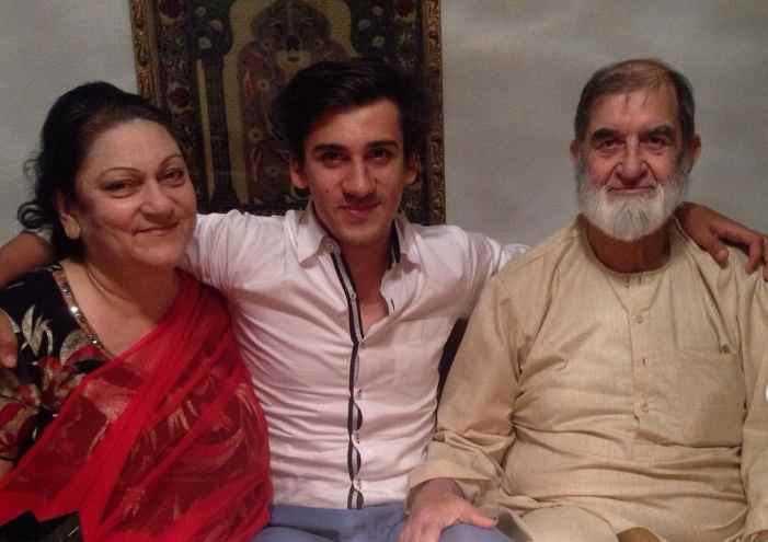 Hamid Barkzi with his parents