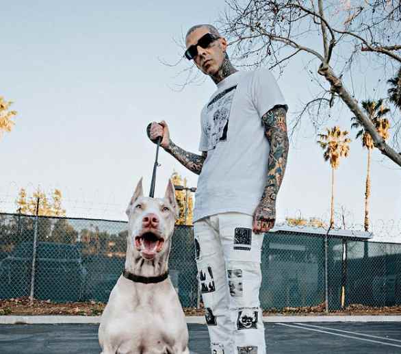 Travis Barker with his pet dog