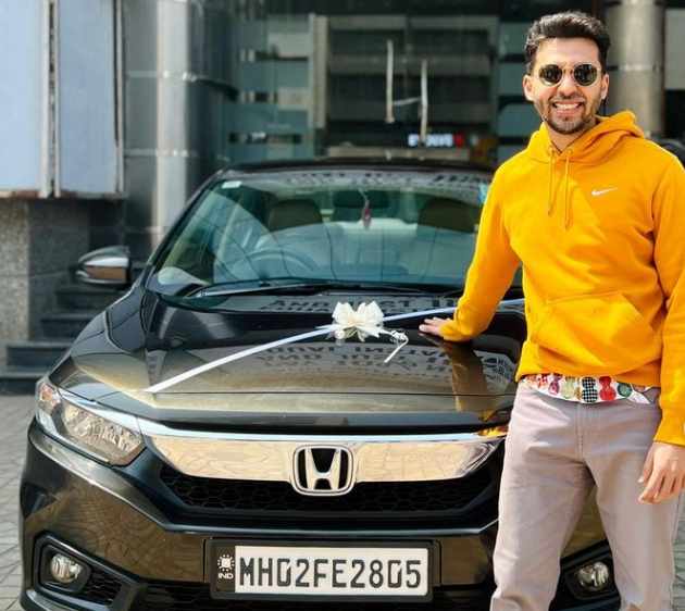 Abhay Mahajan showcasing his luxurious car