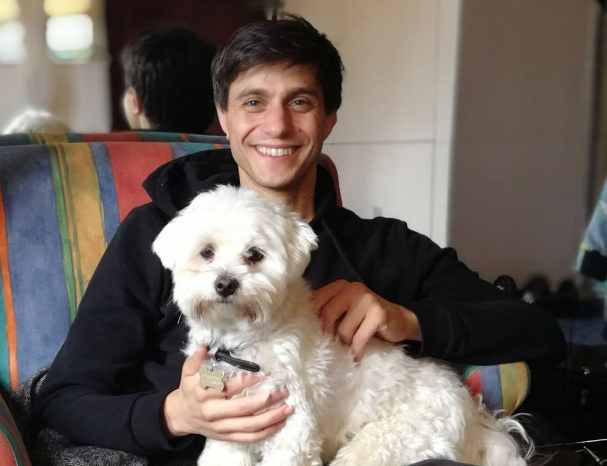 Gideon Glick with his pet dog