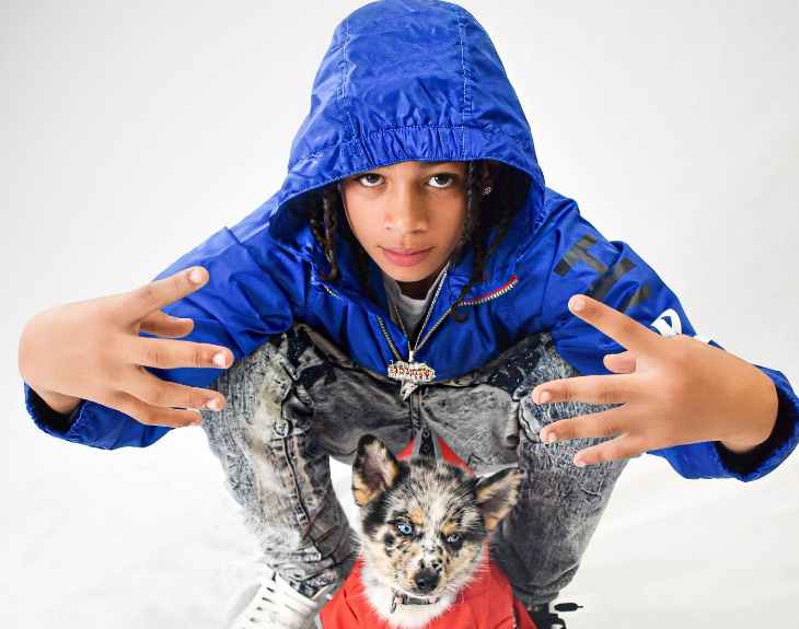 Jae Lynx with his pet dog