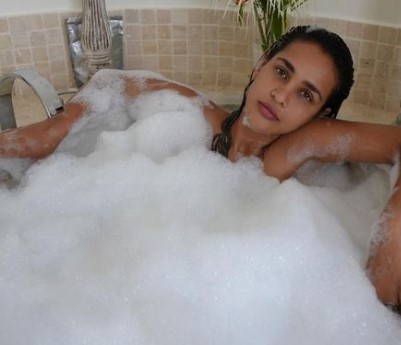 Aisha Sharma in the bathtub