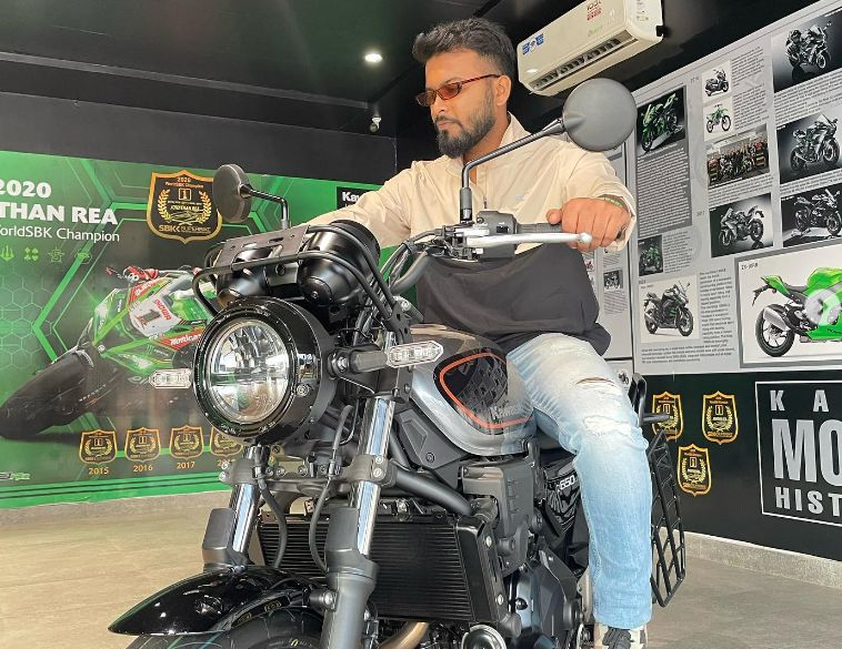 Harpal Saikia showcasing his luxurious bike