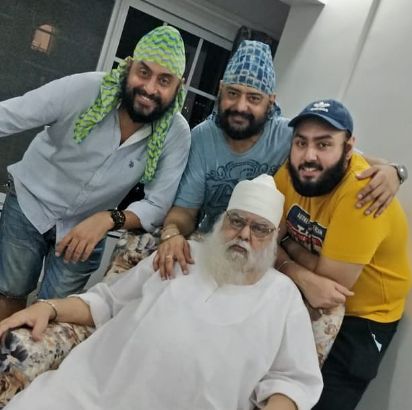 Balvinder Singh Suri with his father, brother, and son 
