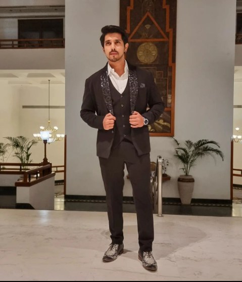 Kanwar Dhillon in black suit