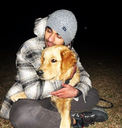 Prit Kamani with his pet dog