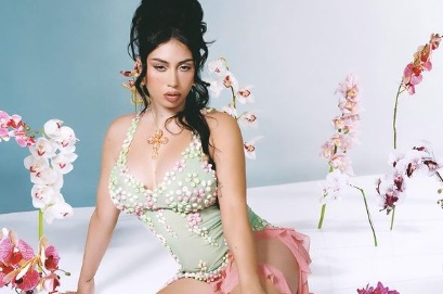 Kali Uchis bra size body measurements eye color age height net worth weight songs albums, and eps 